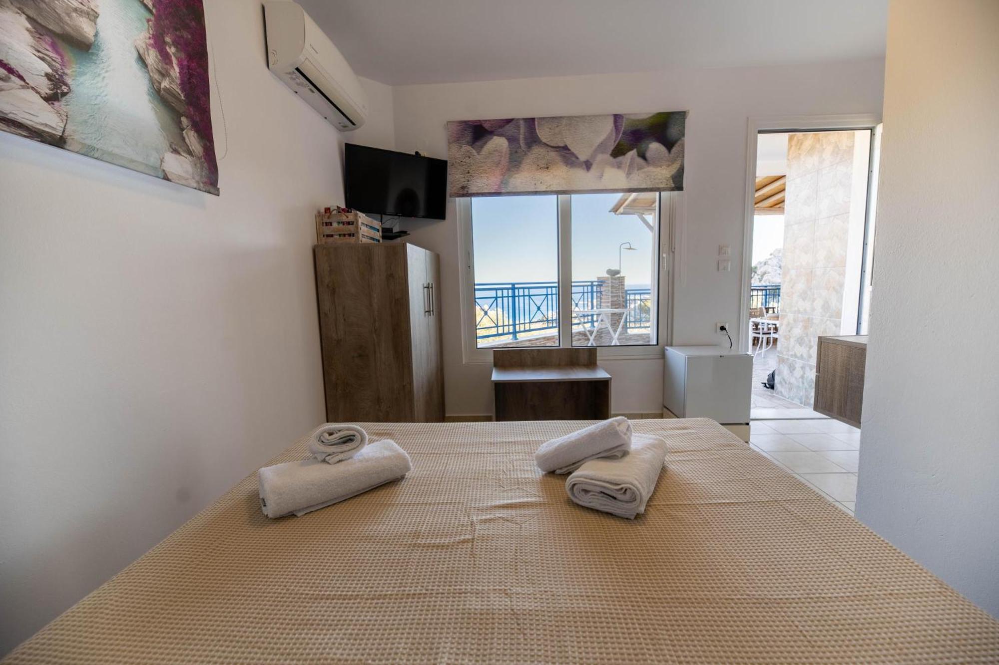 Aperanto Galazio Apartment Архангелос Экстерьер фото